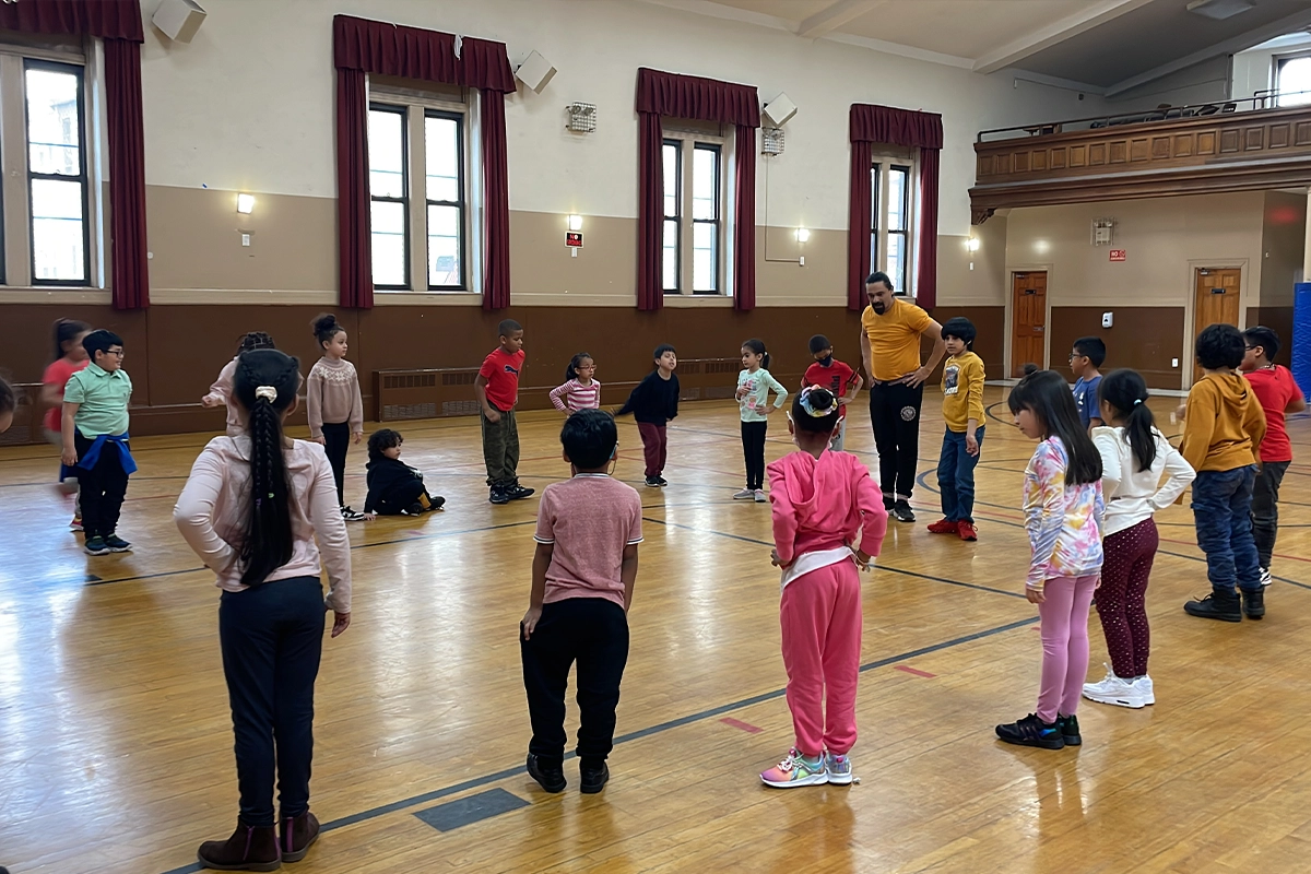 Group of children enjoying a dance class in a safe and supportive environment at The Belfry Centre in Brooklyn.